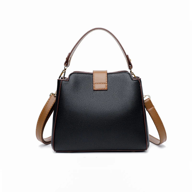 Small Hand and Shoulder Bag from Yogodlns. Made with luxurious PU leather