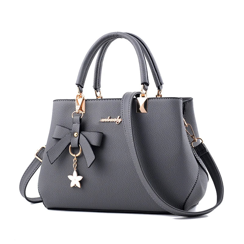 Handbag Shoulder Bag Women's with Flower Pendant. High-quality PU Leather