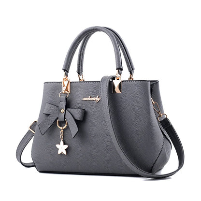 Handbag Shoulder Bag Women's with Flower Pendant. High-quality PU Leather